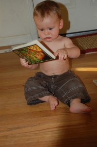 Nesta "reading" Lord of the Flies at 8 or 9 months old.